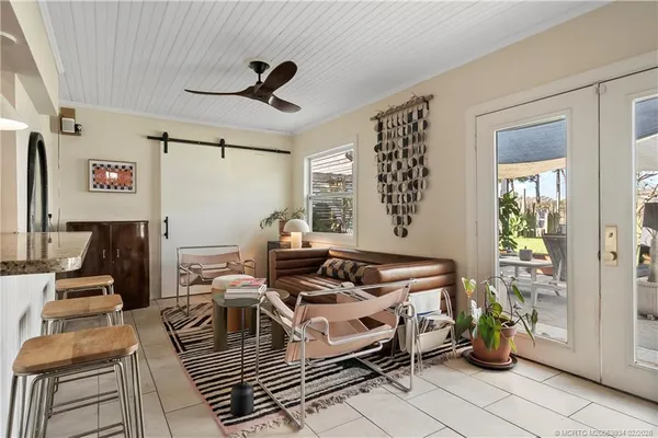 a view of table and chairs in patio