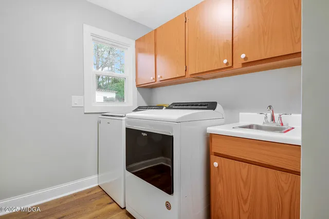 a workspace with furniture and a window