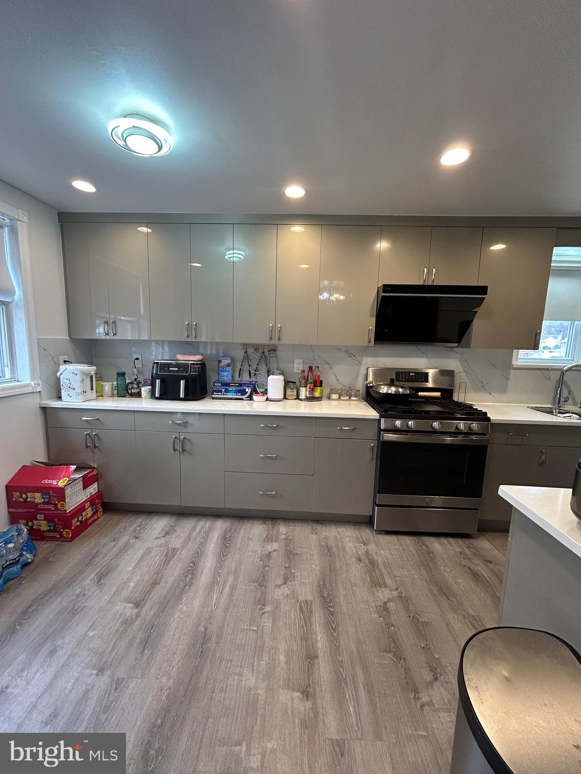 830 Pne Hl Road Philadelphia, PA 19115 - Photo 11 of 42 a kitchen with kitchen island sink cabinets and appliances