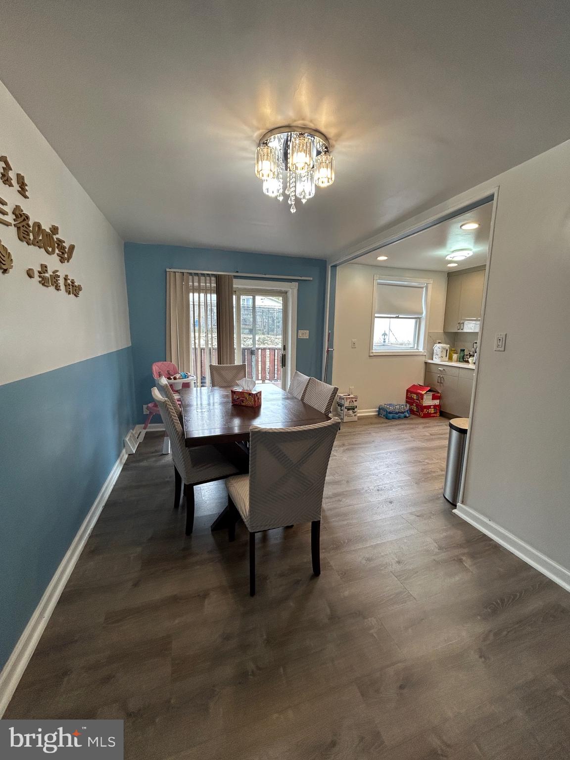 830 Pne Hl Road Philadelphia, PA 19115 - Photo 15 of 42 a living room with furniture a chandelier and a dining table