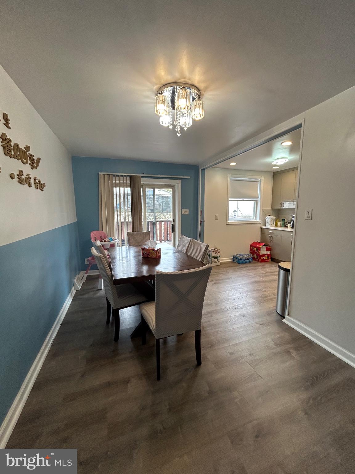 830 Pne Hl Road Philadelphia, PA 19115 - Photo 17 of 42 a living room with furniture a dining table and a chandelier