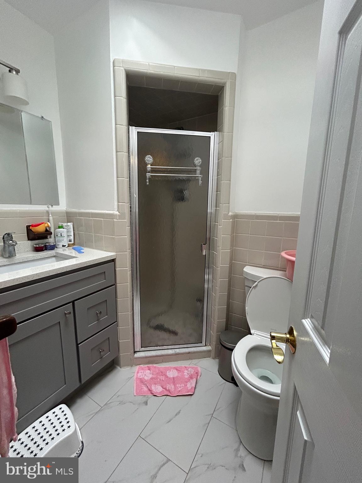 830 Pne Hl Road Philadelphia, PA 19115 - Photo 20 of 42 a bathroom with a sink a toilet and shower