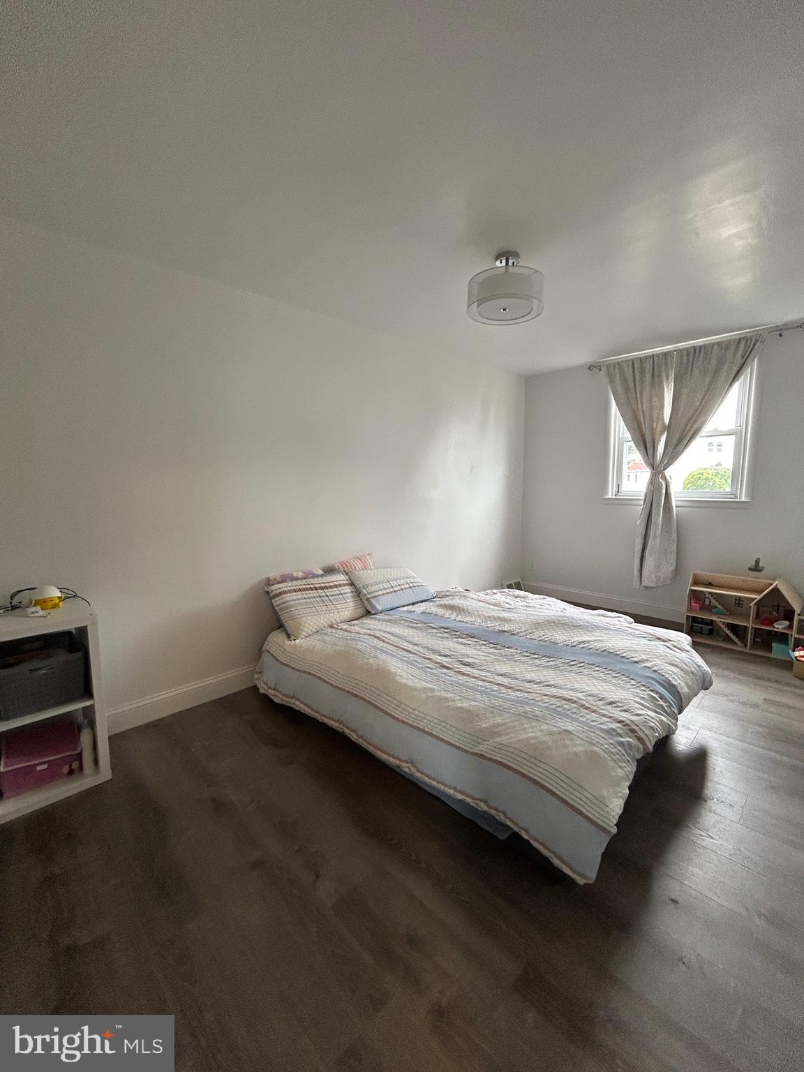 830 Pne Hl Road Philadelphia, PA 19115 - Photo 25 of 42 a bedroom with a bed and a night stand