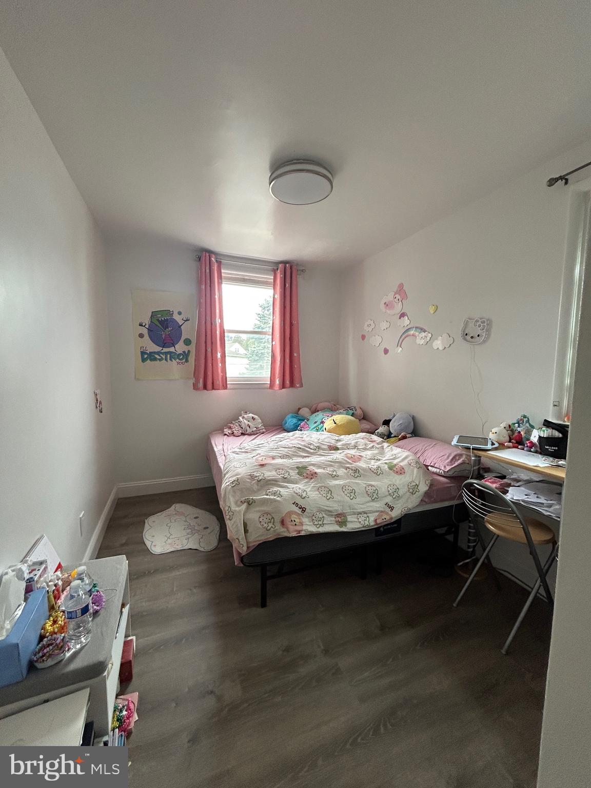 830 Pne Hl Road Philadelphia, PA 19115 - Photo 26 of 42 a bedroom with a bed and a chandelier