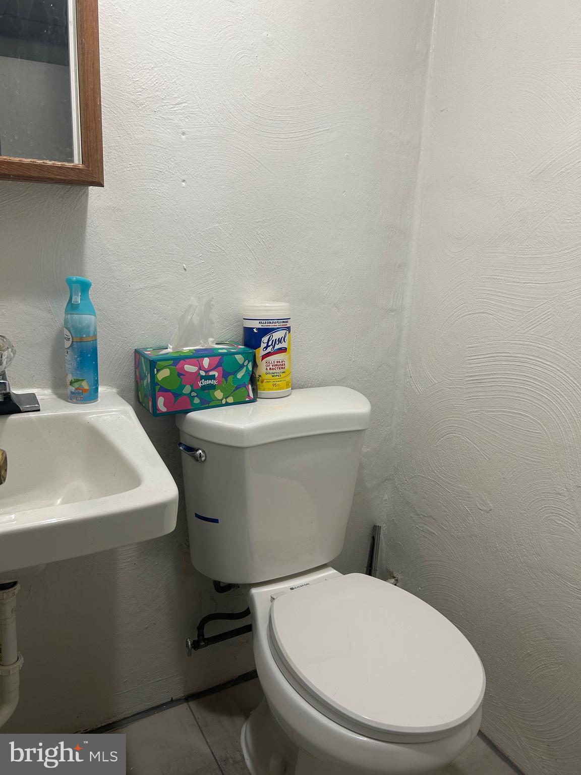 830 Pne Hl Road Philadelphia, PA 19115 - Photo 31 of 42 a white toilet sitting next to a bathroom sink