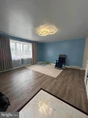 a view of a livingroom with a staircase