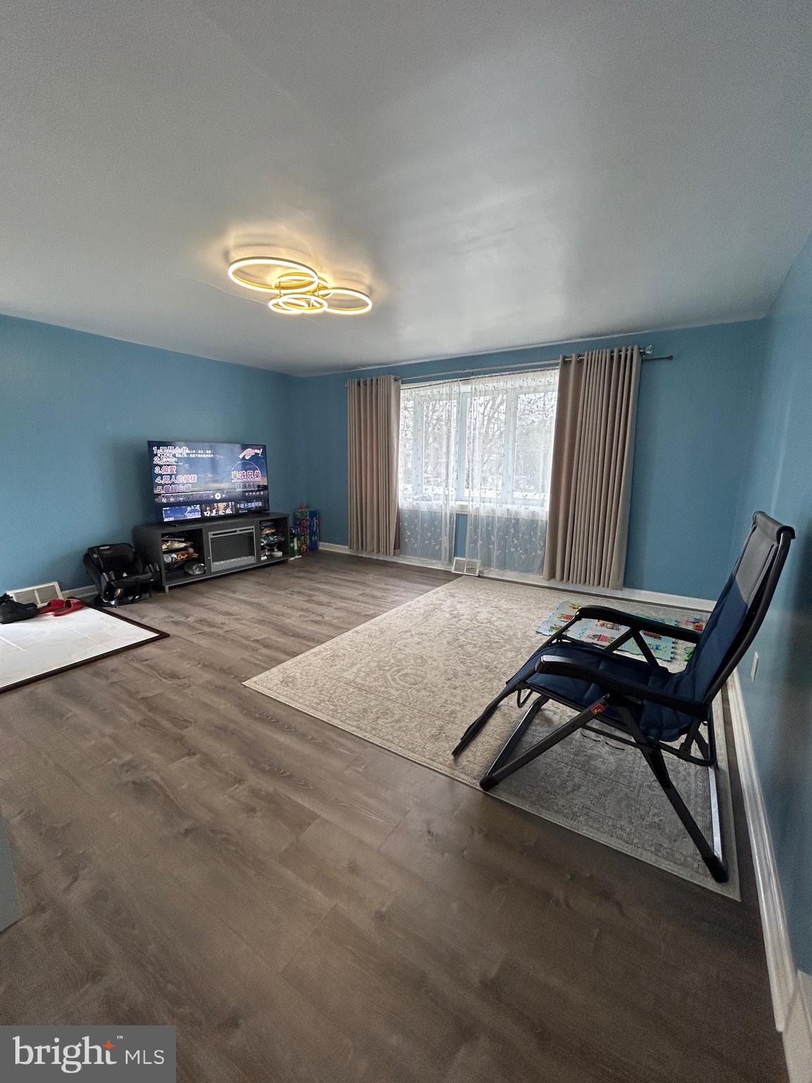 830 Pne Hl Road Philadelphia, PA 19115 - Photo 9 of 42 a view of a room with gym equipment and a large window