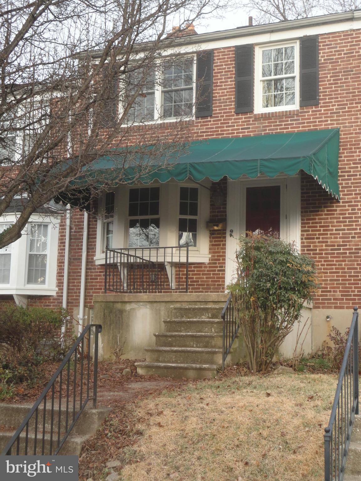 224 Stanmore Road Baltimore, MD 21212 - Photo 1 of 19 a front view of a house with balcony