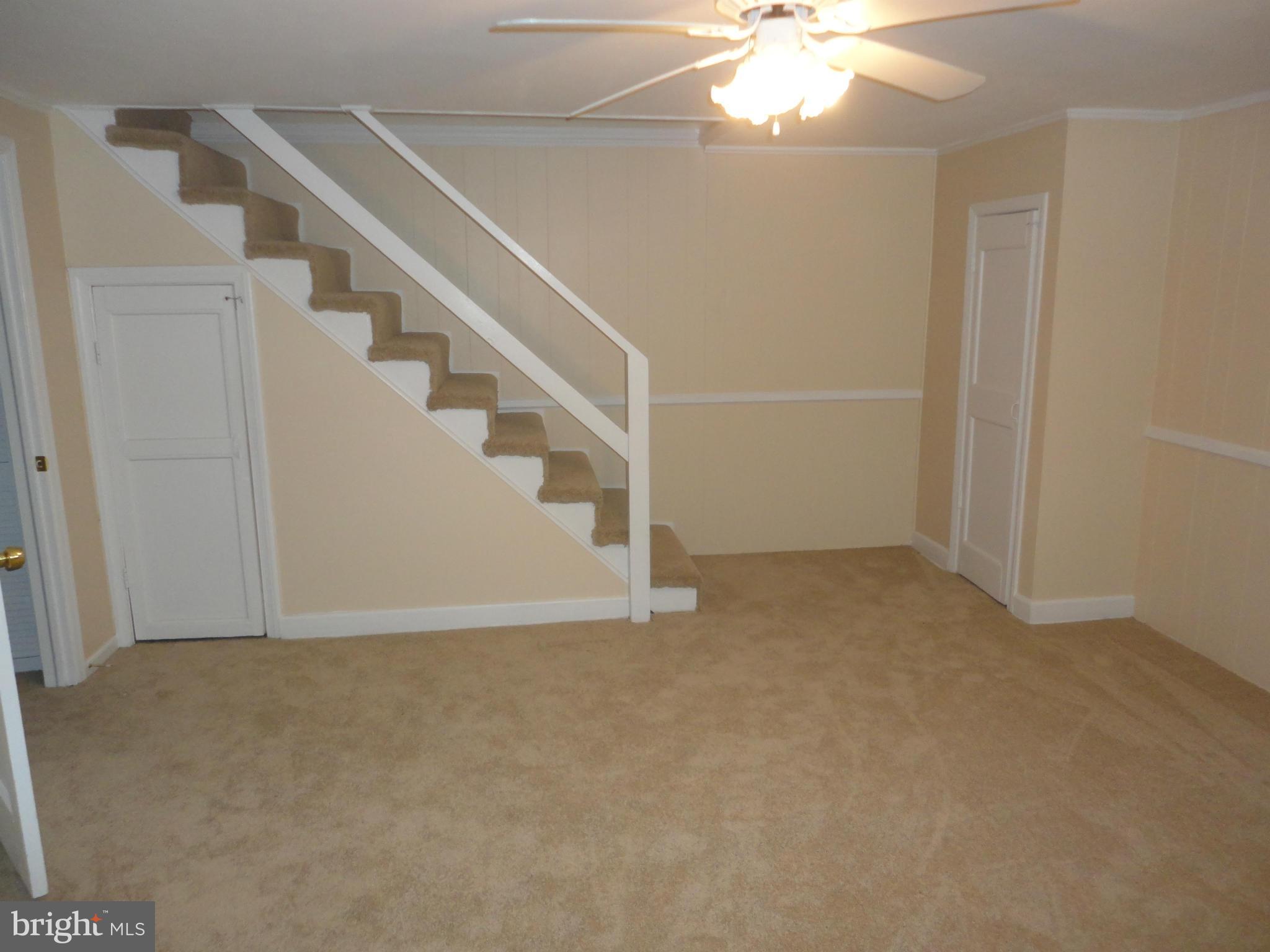 224 Stanmore Road Baltimore, MD 21212 - Photo 11 of 19 a view of an empty room with a window