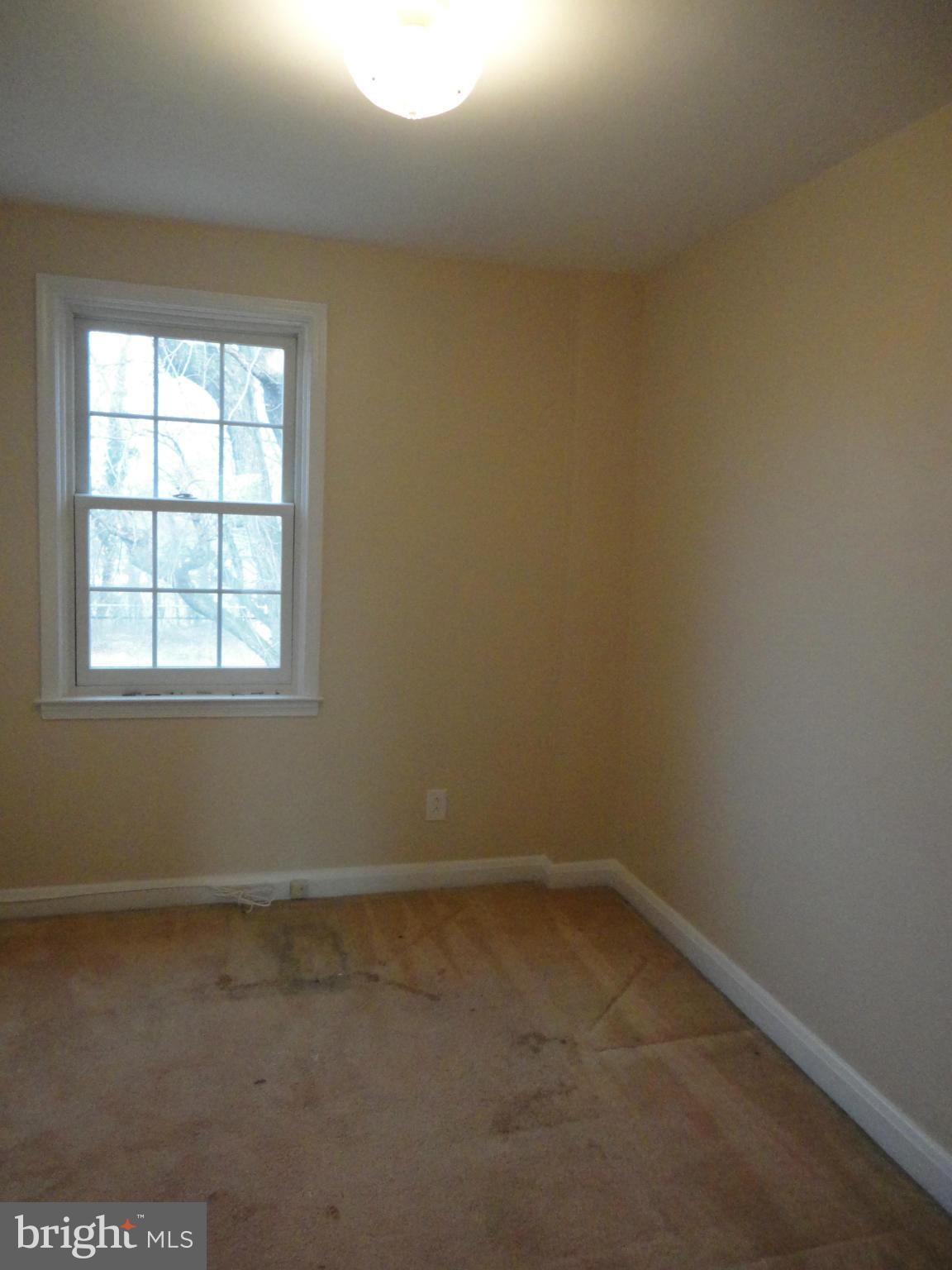 224 Stanmore Road Baltimore, MD 21212 - Photo 12 of 19 an empty room with a window