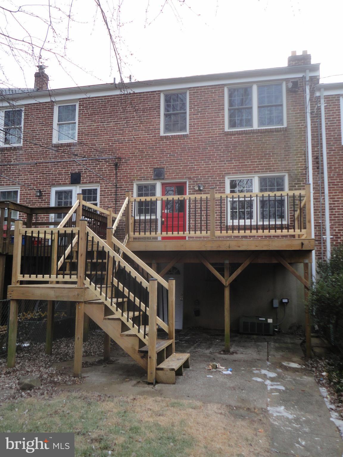224 Stanmore Road Baltimore, MD 21212 - Photo 17 of 19 a view of a house with large windows