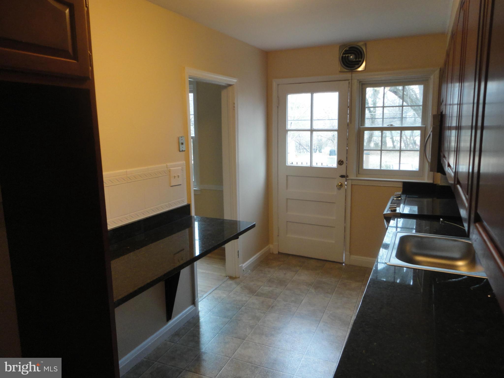 224 Stanmore Road Baltimore, MD 21212 - Photo 7 of 19 a room with window