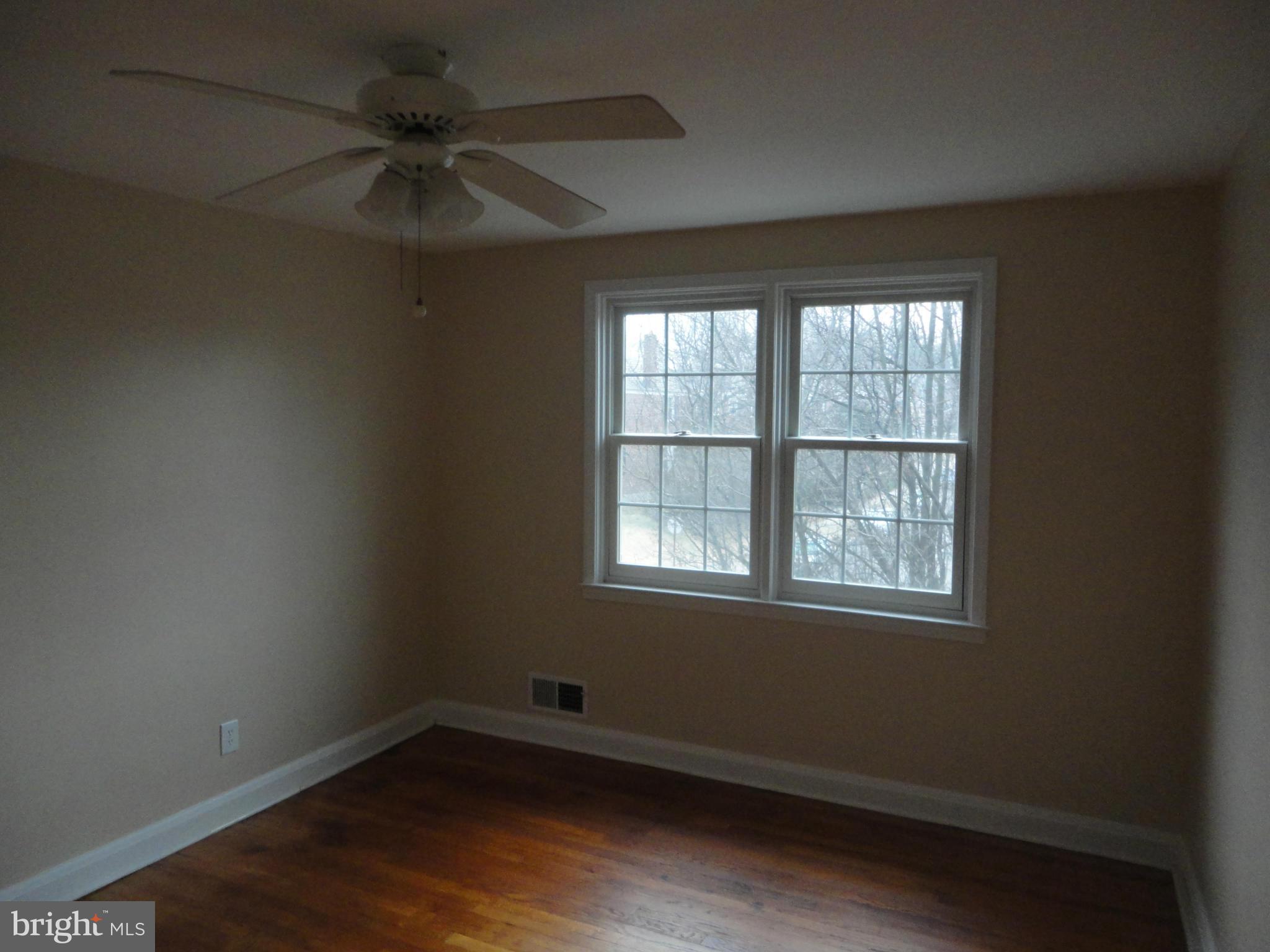 224 Stanmore Road Baltimore, MD 21212 - Photo 9 of 19 an empty room with a window