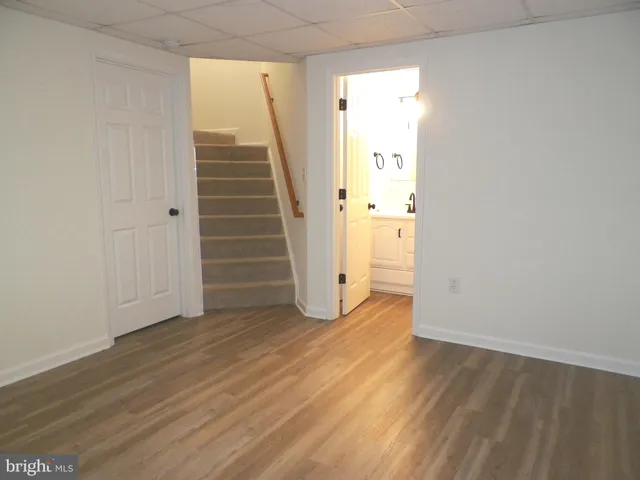 a view of wooden floor in an empty room