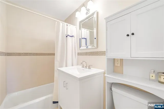 a bathroom with a sink and a bathtub