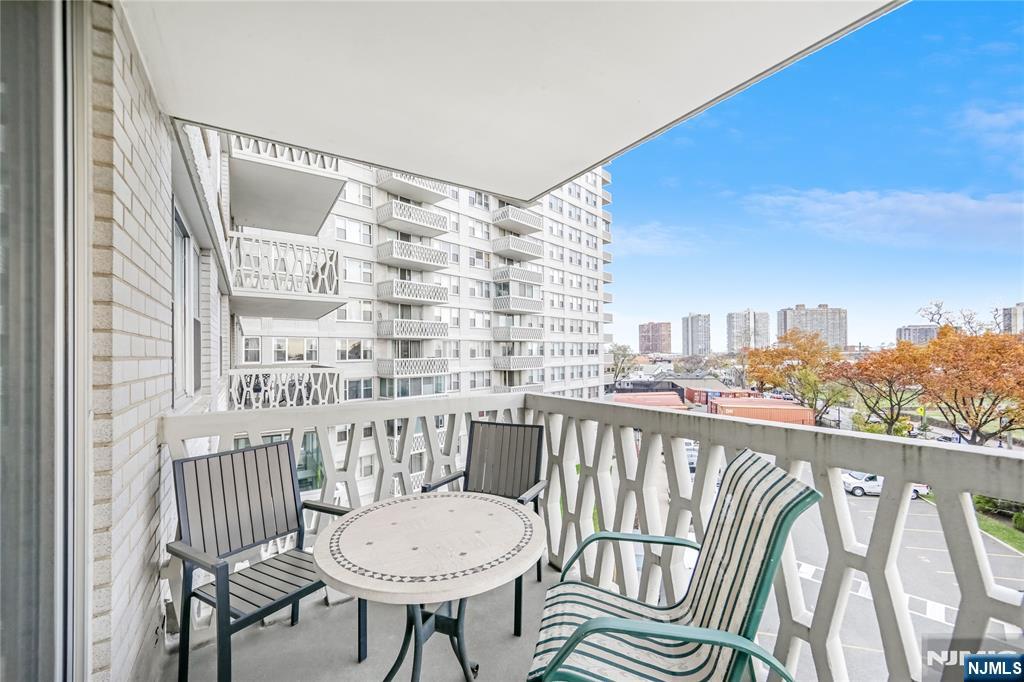 2000 Linwood Avenue, Unit 5L Fort Lee, NJ 07024 - Photo 14 of 26 a view of a balcony with chairs