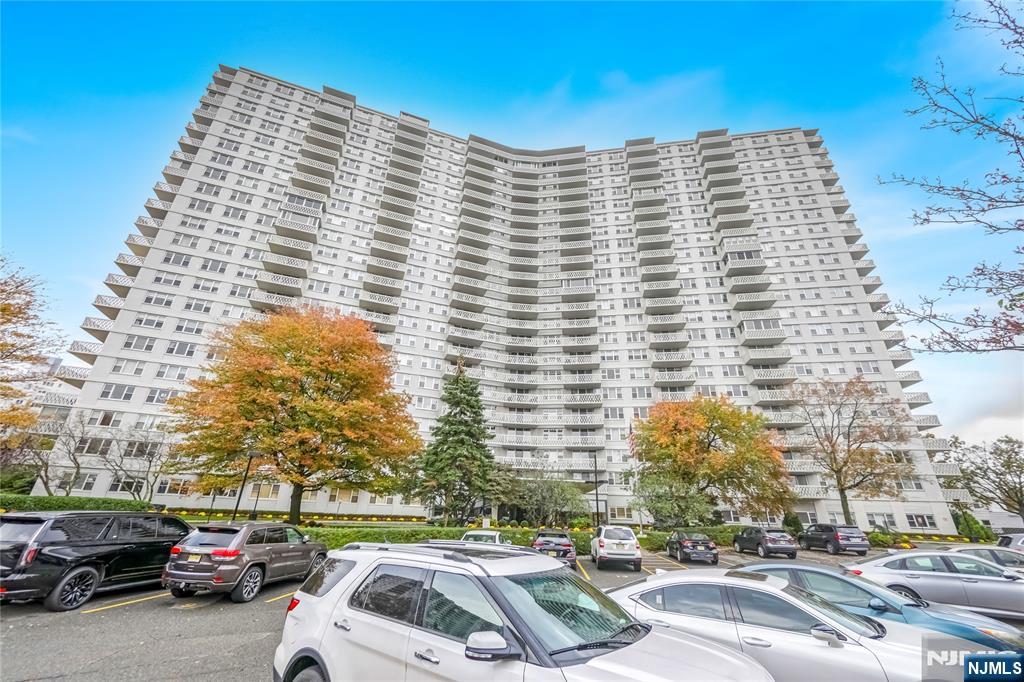 2000 Linwood Avenue, Unit 5L Fort Lee, NJ 07024 - Photo 22 of 26 a front view of a building with parking space