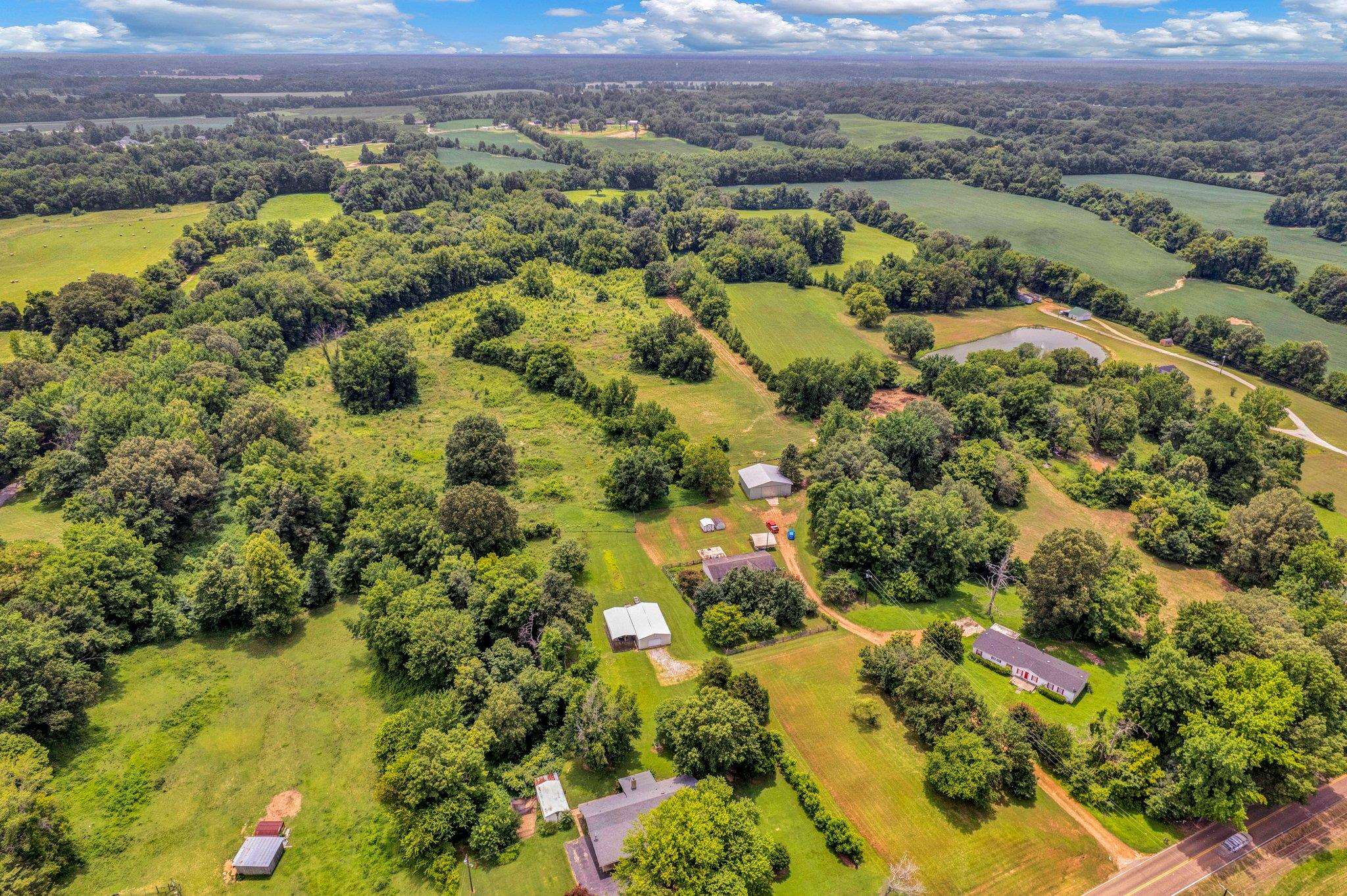 a view of a city with mountains in the background