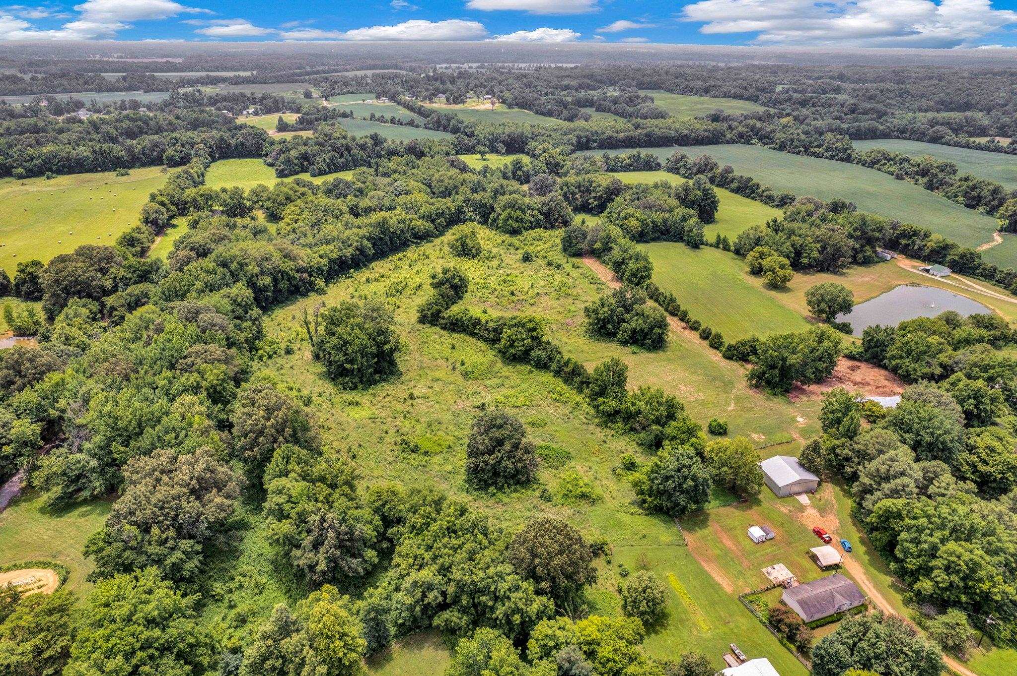 0 Holly Grove Road Covington, TN 38019 - Photo 2 of 11 a view of a city with mountains in the background