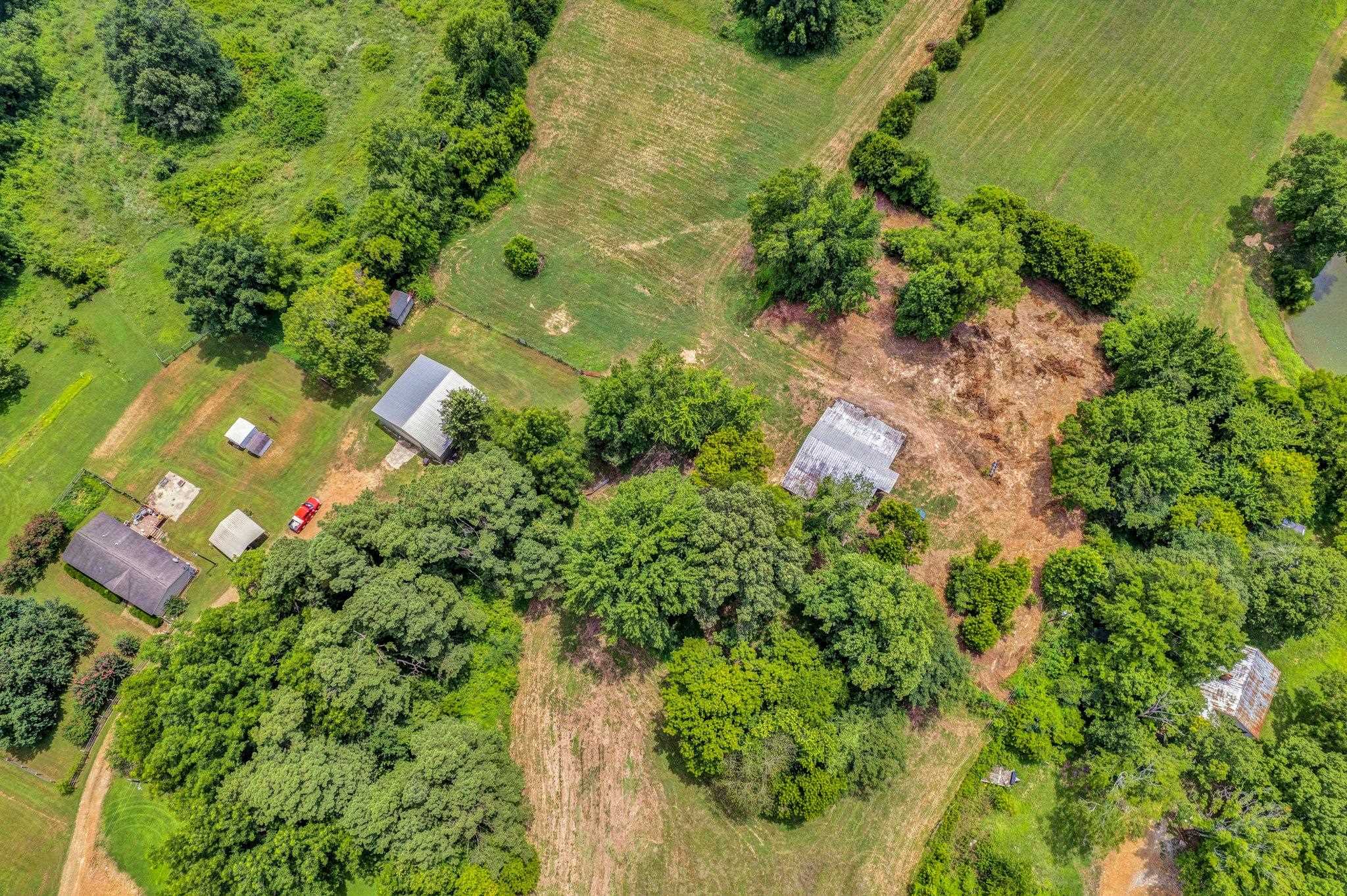 0 Holly Grove Road Covington, TN 38019 - Photo 5 of 11 an aerial view of a house with a yard