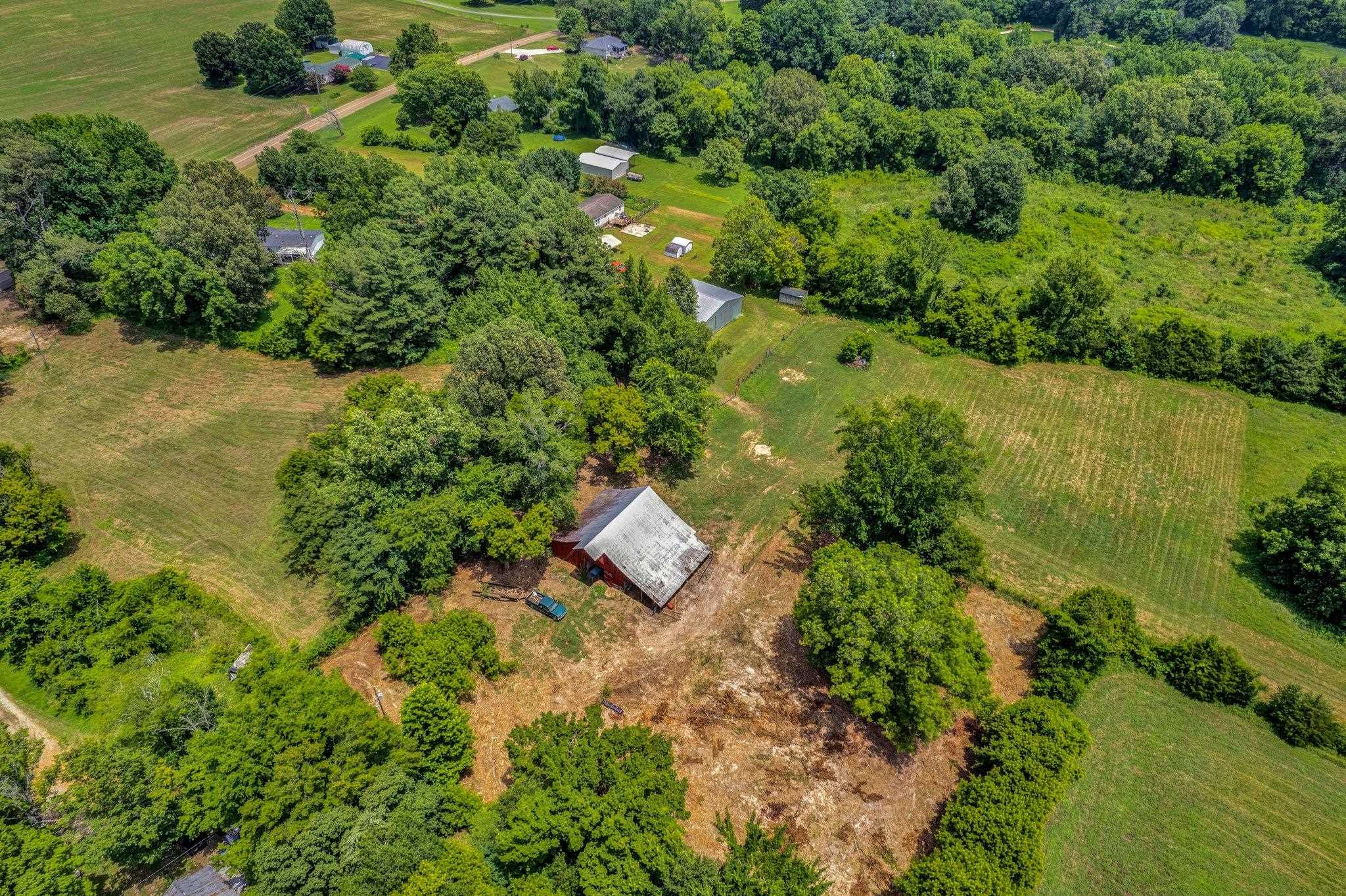 0 Holly Grove Road Covington, TN 38019 - Photo 9 of 11 an aerial view of residential house with outdoor space and trees all around