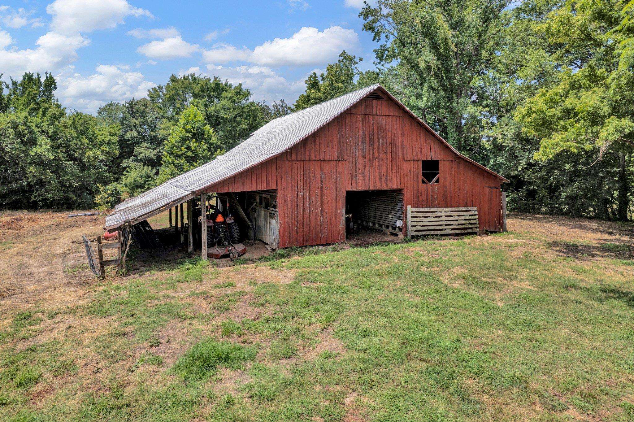 0 Holly Grove Road Covington, TN 38019 - Photo 10 of 11 a backyard of a house with lots of green space