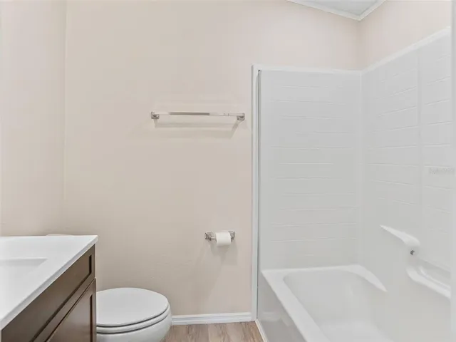 a bathroom with a sink and toilet