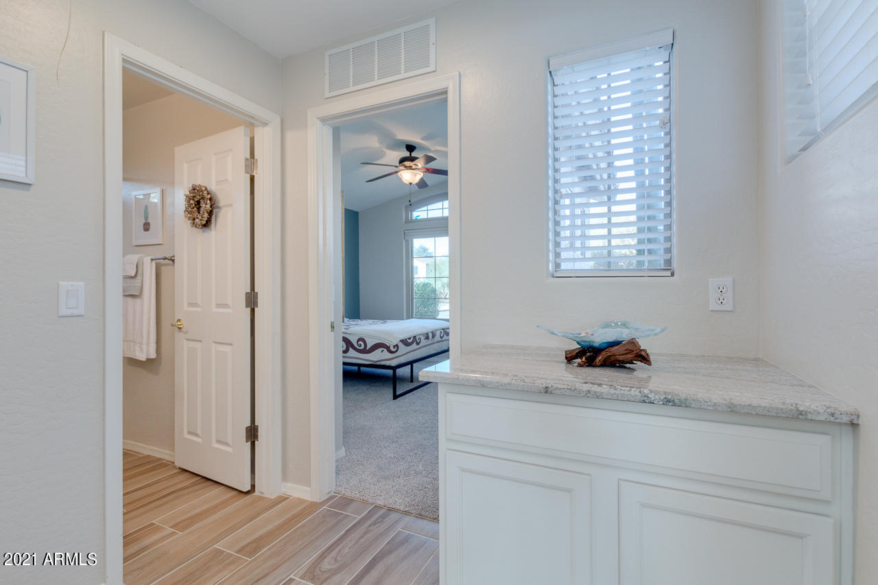 17541 West Rock Ledge Road Goodyear, AZ 85338 - Photo 25 of 62 Hallway storage w/granite counter top