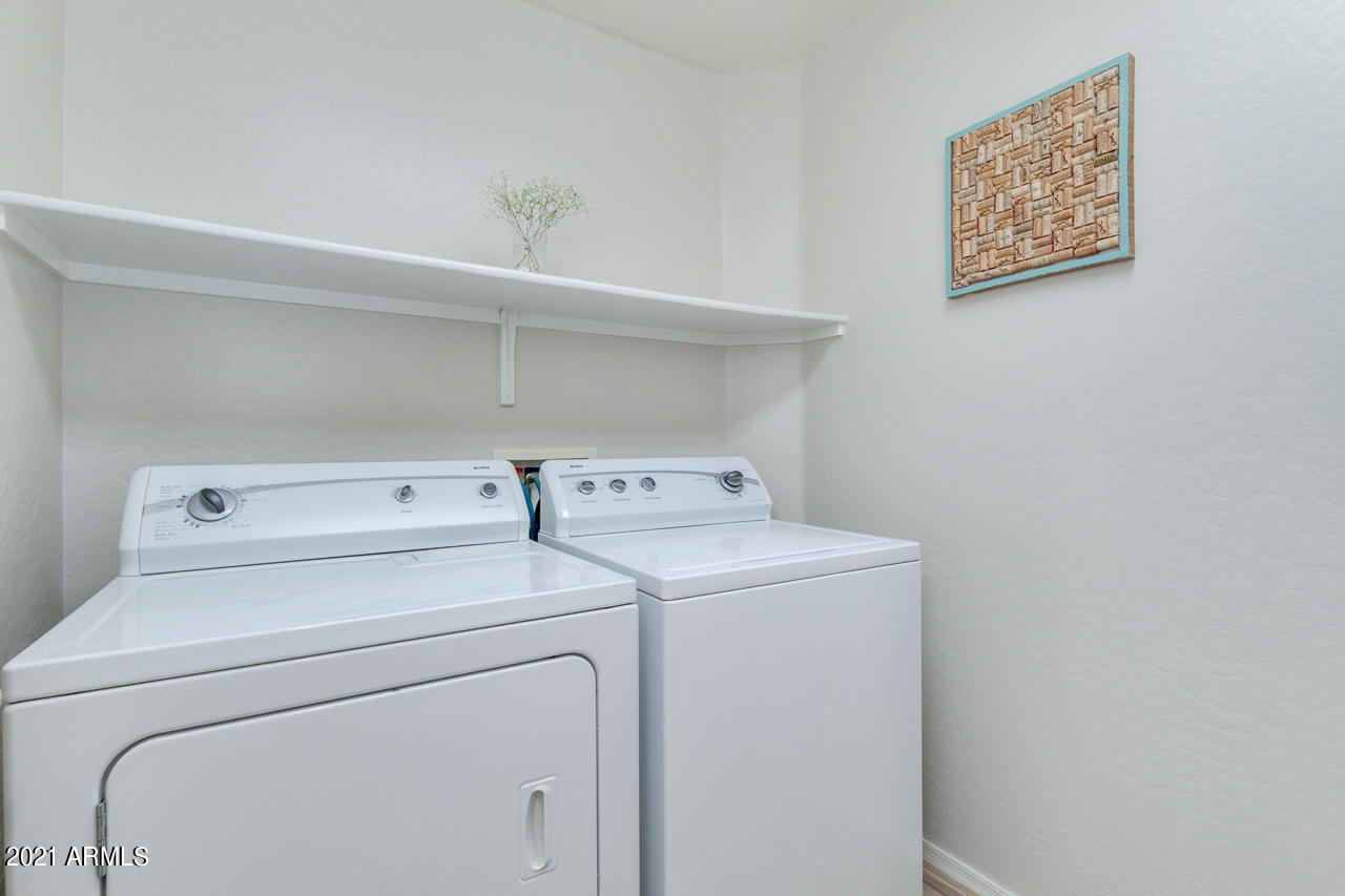 17541 West Rock Ledge Road Goodyear, AZ 85338 - Photo 31 of 62 Washer & dryer stay!