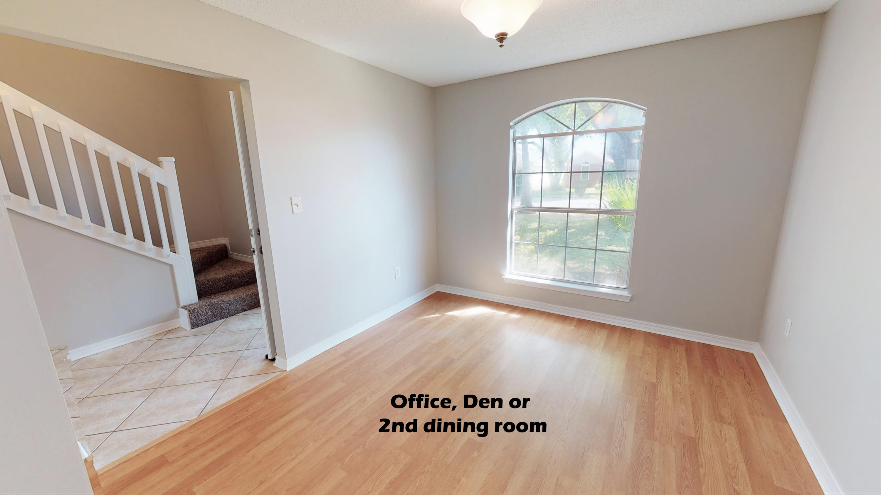 3621 Goldsbys Way Destin, FL 32541 - Photo 18 of 38 an empty room with wooden floor and windows