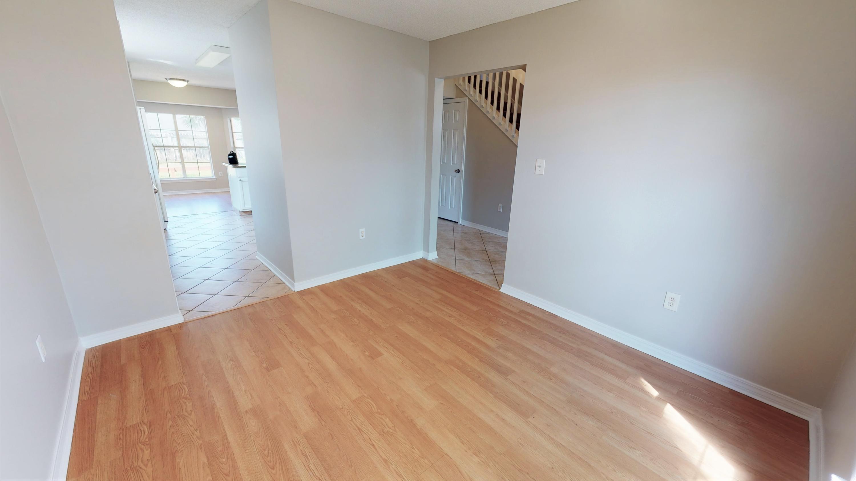 3621 Goldsbys Way Destin, FL 32541 - Photo 19 of 38 a view of empty room with wooden floor