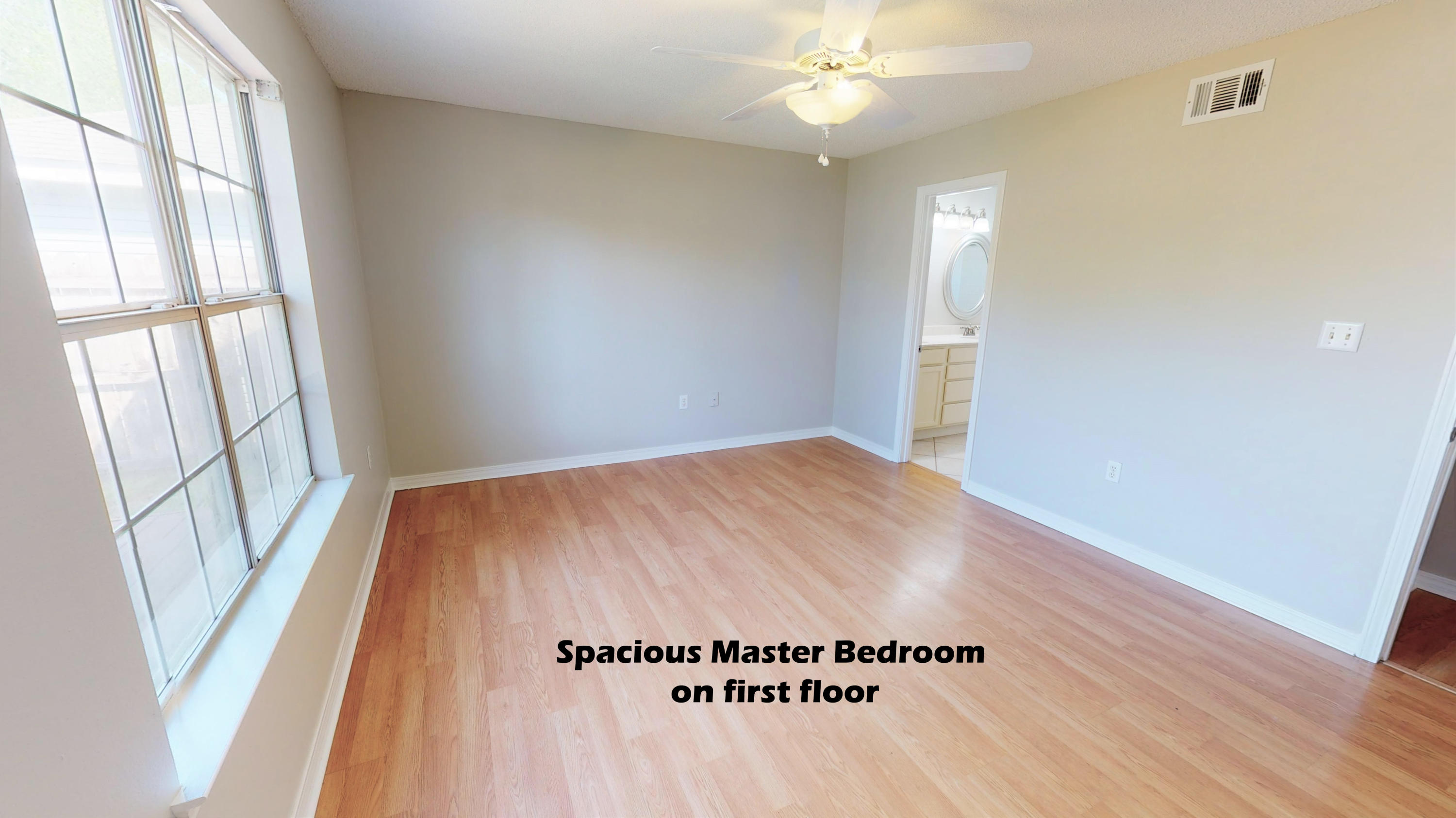 3621 Goldsbys Way Destin, FL 32541 - Photo 20 of 38 wooden floor in an empty room with a window