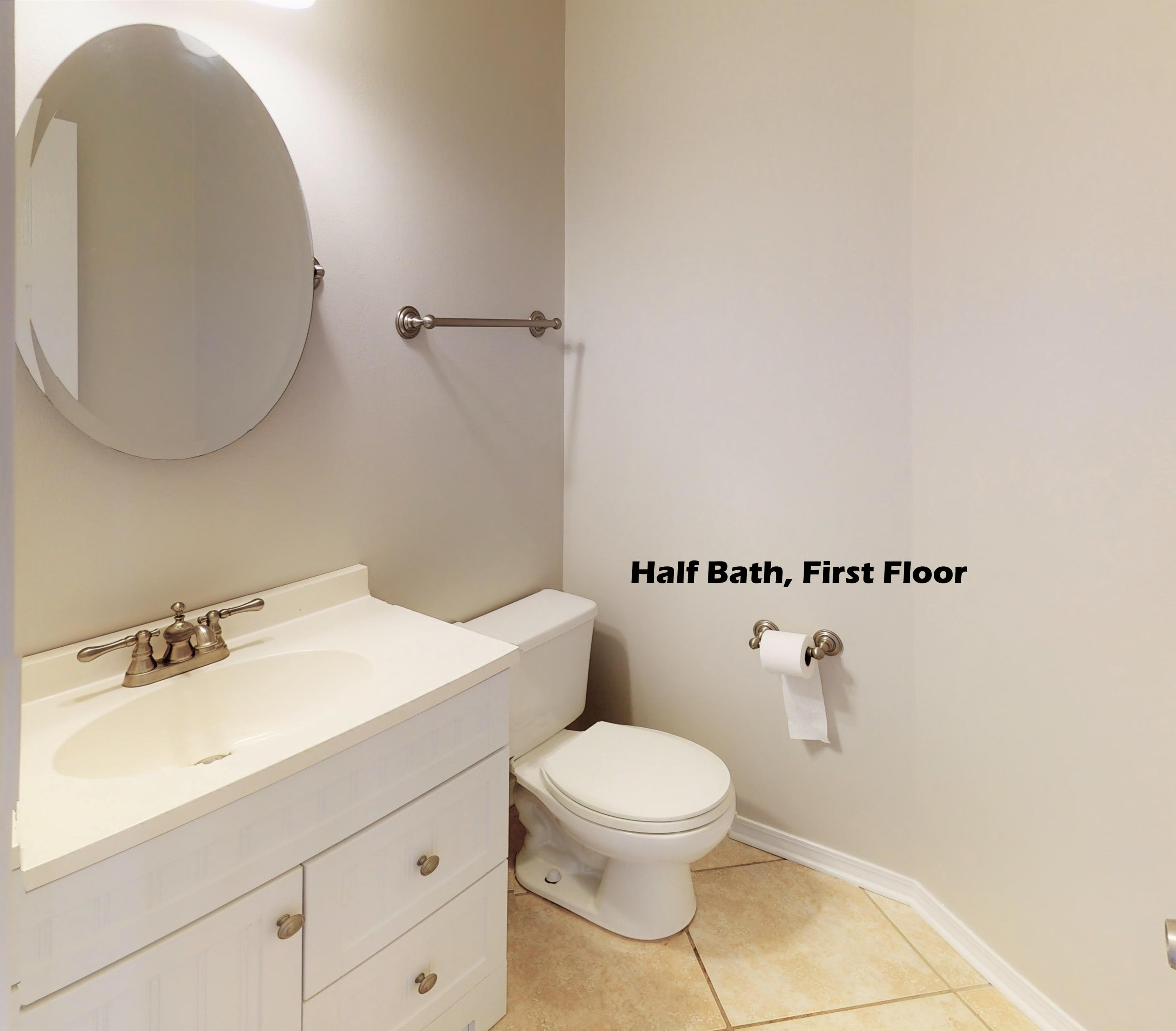 3621 Goldsbys Way Destin, FL 32541 - Photo 25 of 38 a bathroom with a toilet a sink and mirror