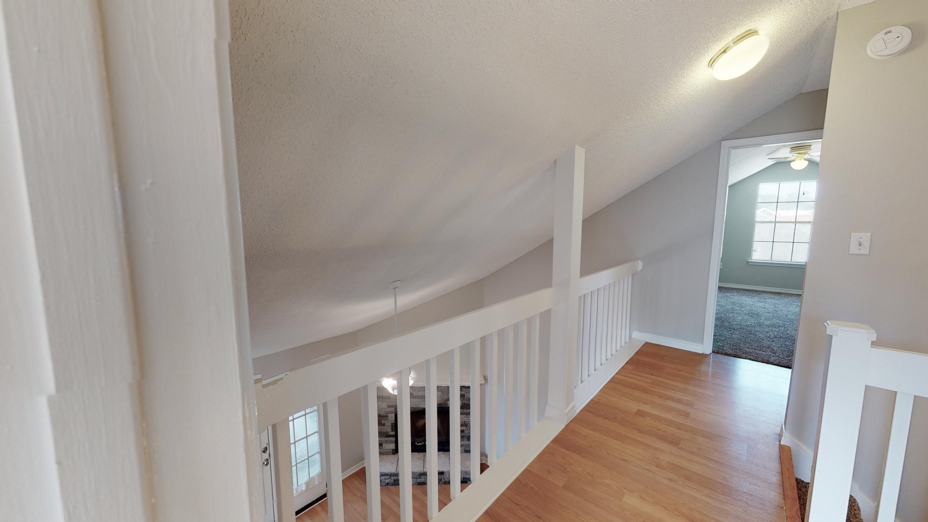 3621 Goldsbys Way Destin, FL 32541 - Photo 26 of 38 a view of a hallway with wooden floor and entryway