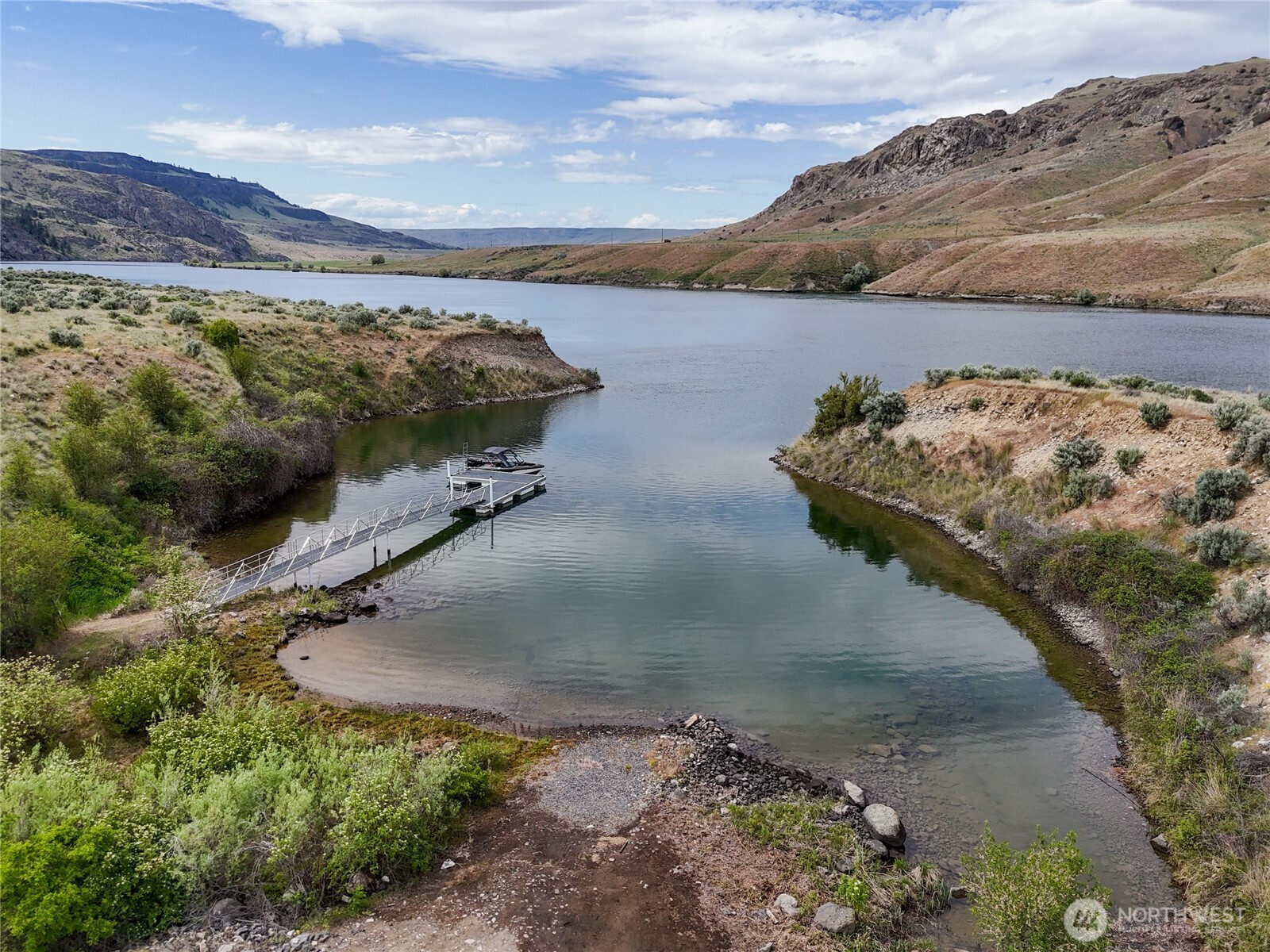 0 Q Road Northeast Mansfield, WA 98830 - Photo 7 of 29 a view of a lake with a mountain