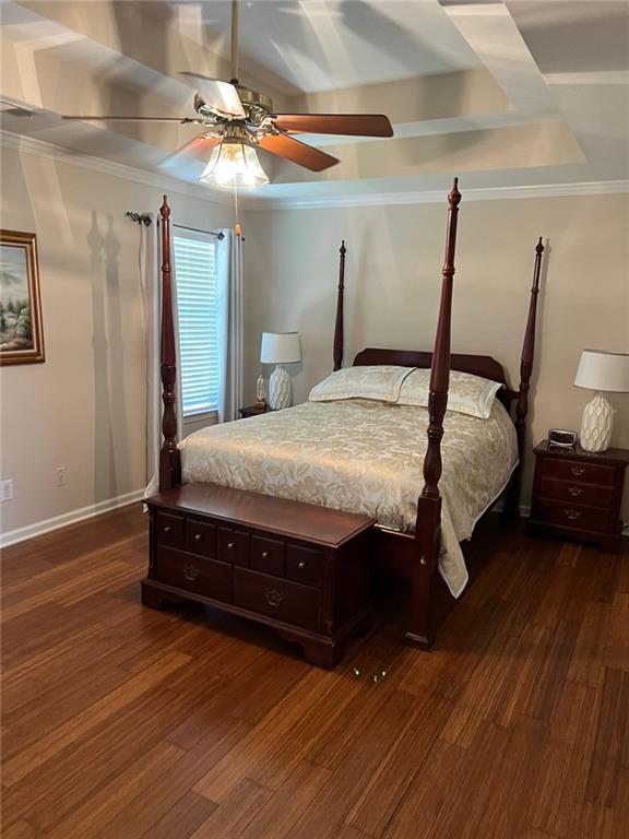 2430 Jakin Way Suwanee, GA 30024 - Photo 32 of 55 a room with a bed and a chandelier