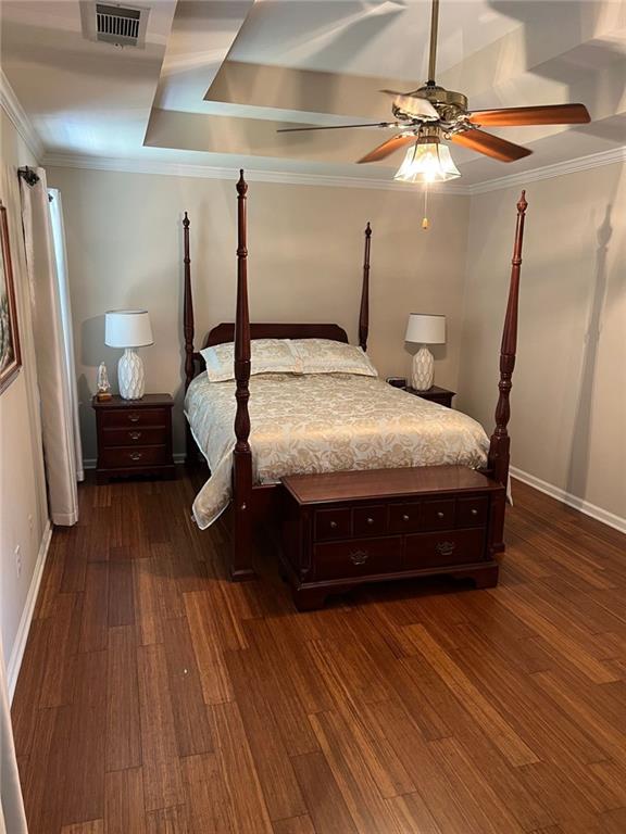 2430 Jakin Way Suwanee, GA 30024 - Photo 33 of 55 a bed sitting in a bedroom next to a lamp