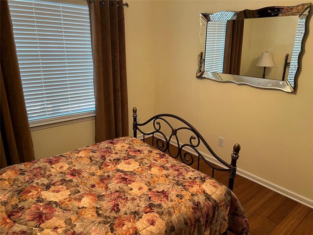 2430 Jakin Way Suwanee, GA 30024 - Photo 39 of 55 a bedroom with a bed and a window