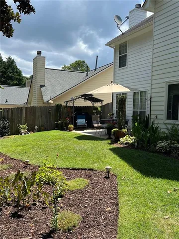 a view of outdoor space and tennis court