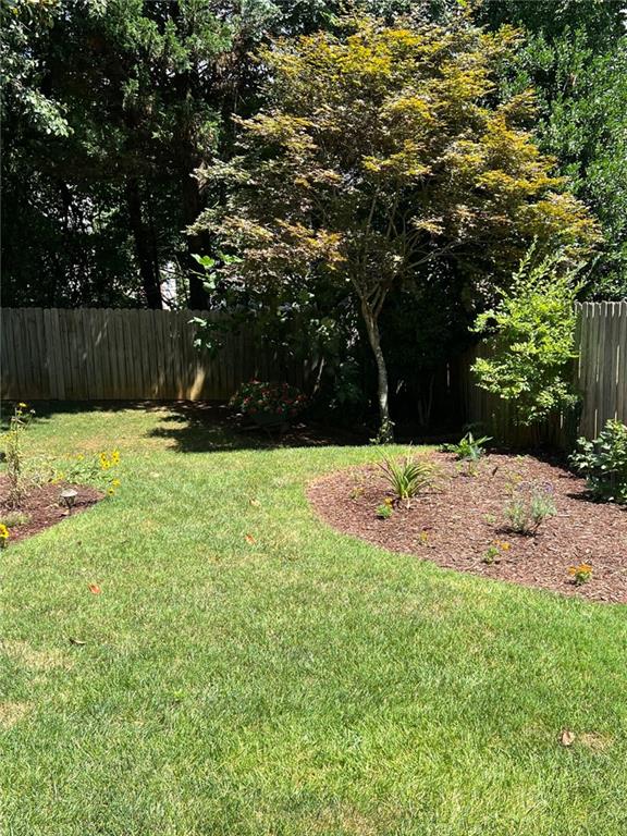 2430 Jakin Way Suwanee, GA 30024 - Photo 52 of 55 a view of backyard with green space