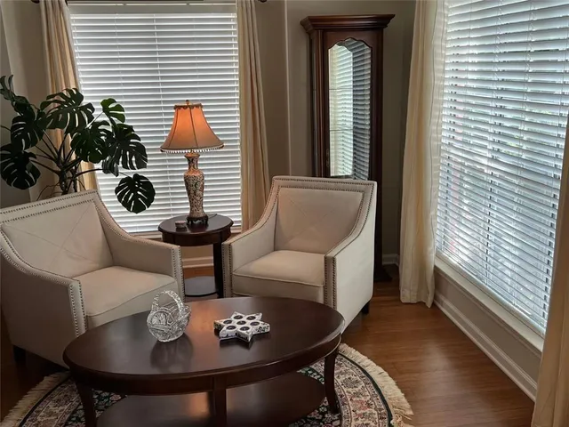 a view of a dining room with furniture and chandelier kitchen view