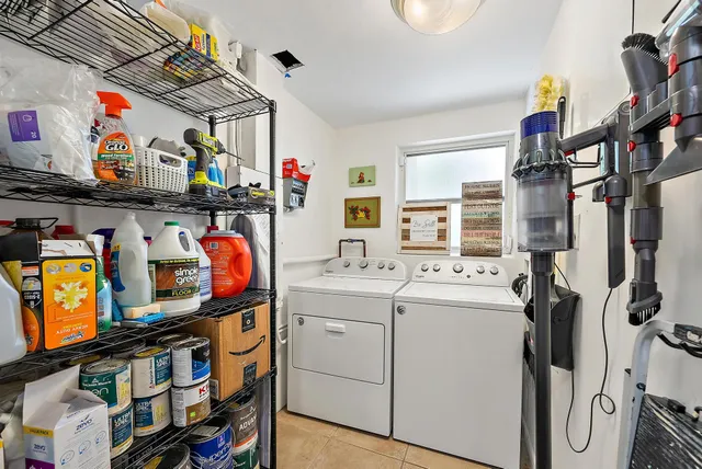 a storage room with washer and dryer