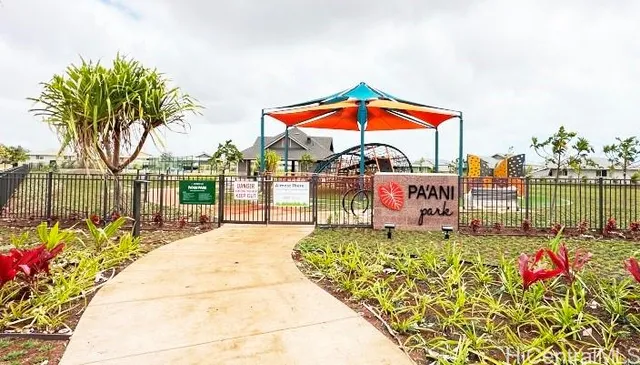 a view of swimming pool outdoor seating and city view