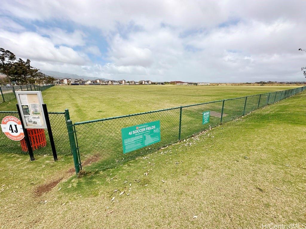 91-1560 Laauala Street Ewa Beach, HI 96706 - Photo 19 of 20 a view of a yard with swimming pool
