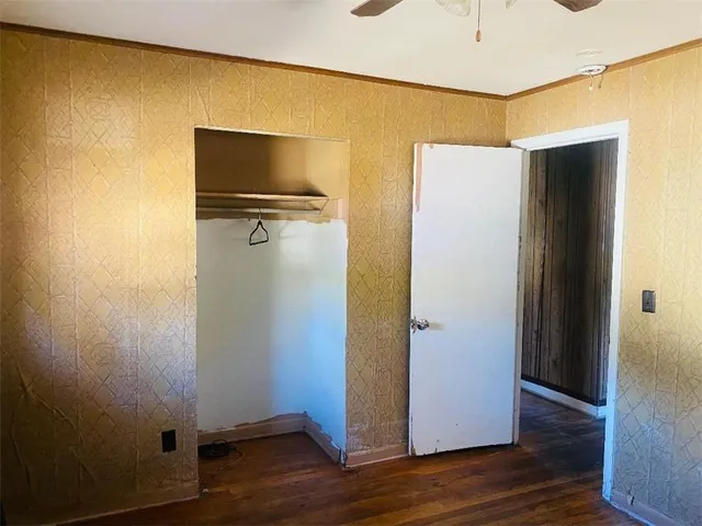 a view of a livingroom with wooden floor