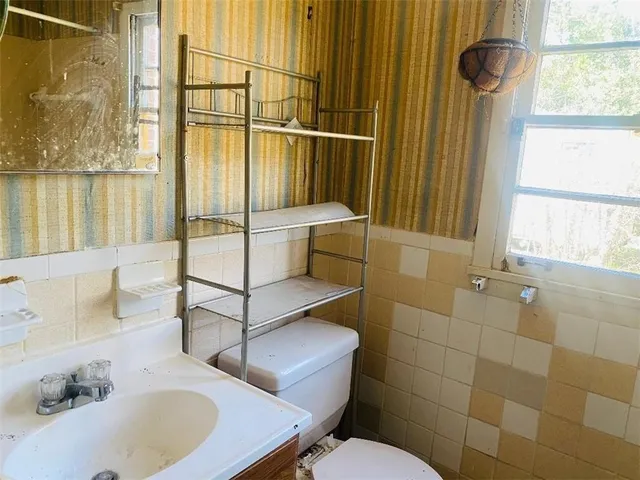 a bathroom with a sink and a shower