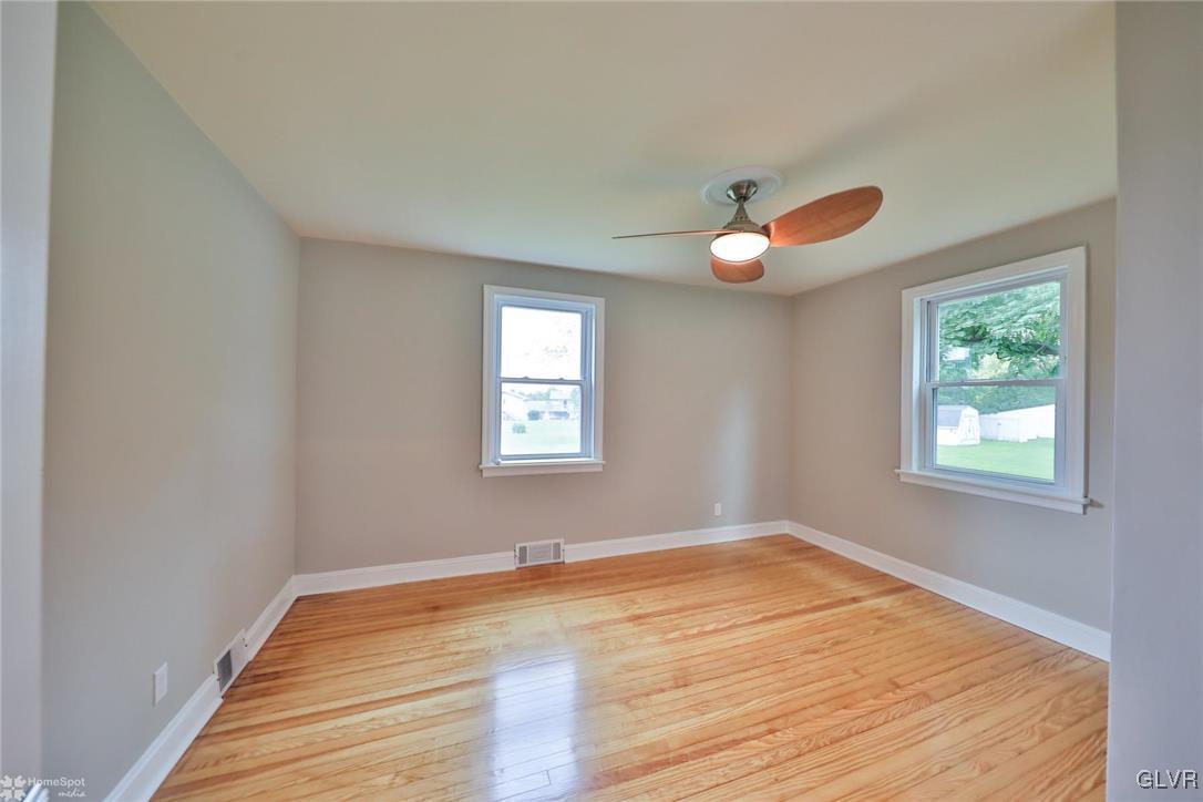 475 Cherry Hill Road Nazareth, PA 18064 - Photo 18 of 46 wooden floor in an empty room with a window