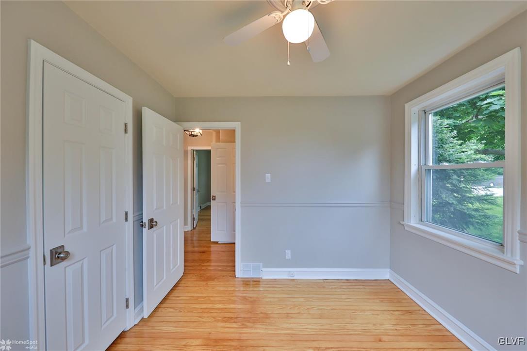 475 Cherry Hill Road Nazareth, PA 18064 - Photo 23 of 46 a view of a hallway with wooden floor and window