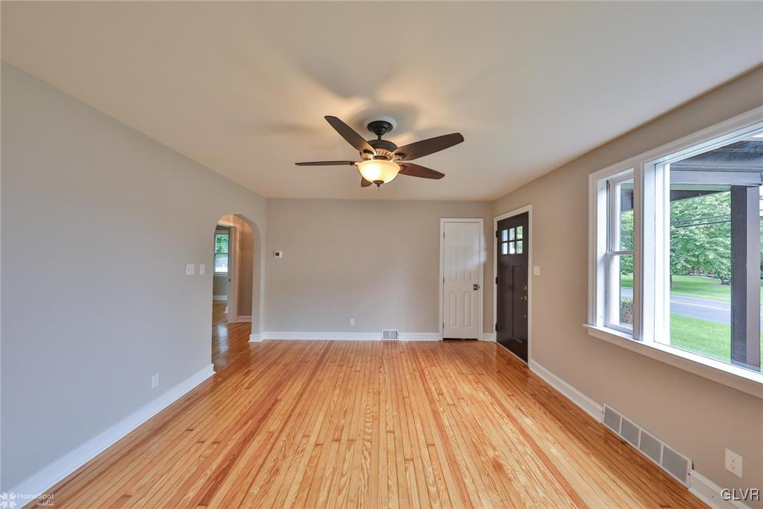 475 Cherry Hill Road Nazareth, PA 18064 - Photo 9 of 46 a view of empty room with wooden floor and fan