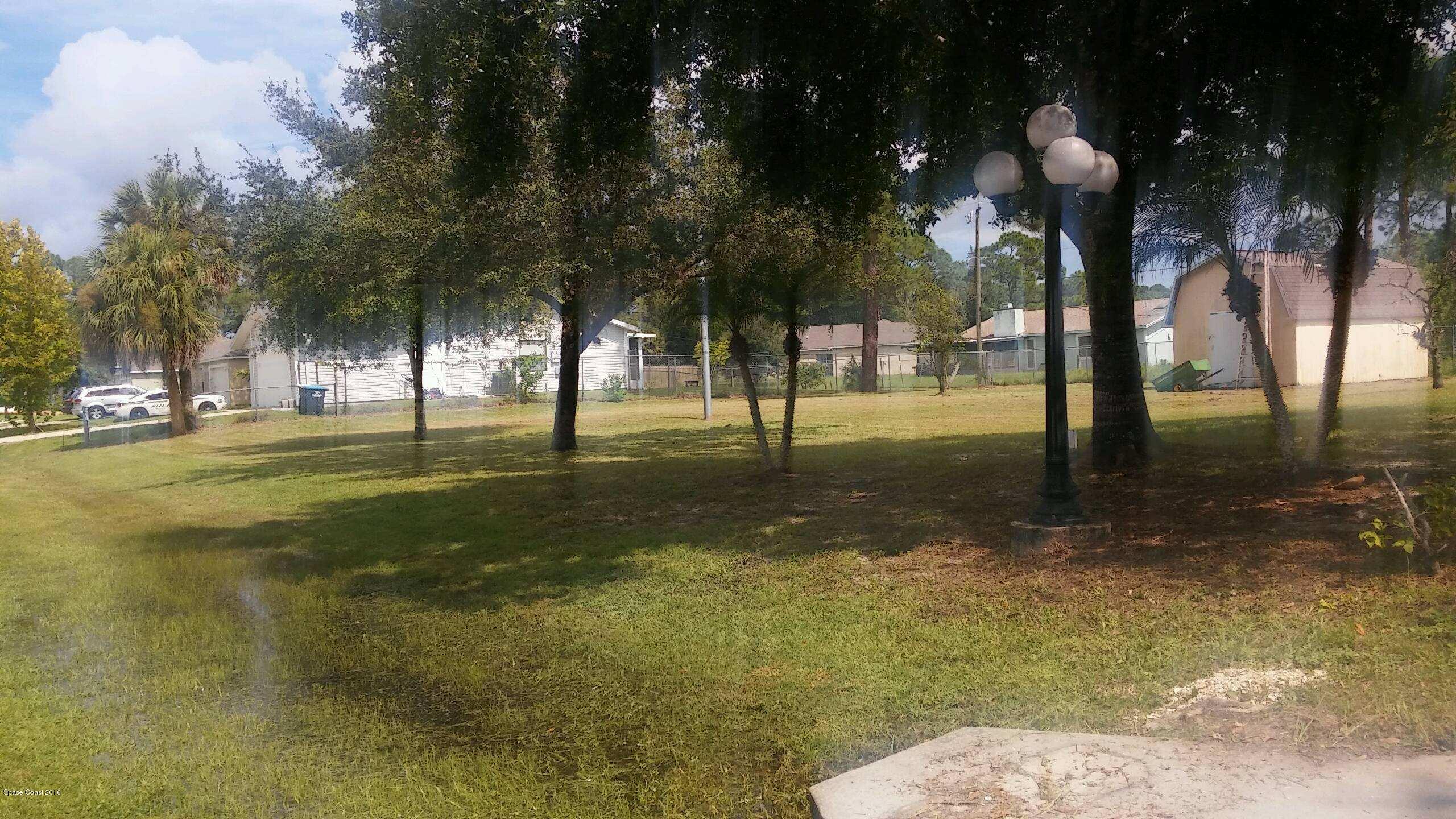 326 Tatum Road Southwest Palm Bay, FL 32908 - Photo 22 of 25 a view of a park with of trees